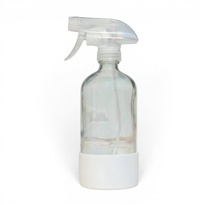 Bubble Gallery 16oz clear glass spray bottle with white protective sleeve and clear trigger sprayer.