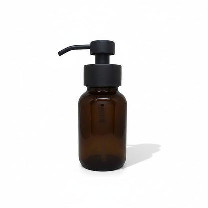 Bubble Gallery amber glass foaming soap dispenser with black metal pump, 250 mL, refillable and reusable.