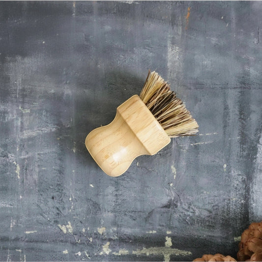 Bubble Gallery sustainable sisal and palm pot scrubber with a bamboo handle for heavy-duty kitchen cleaning