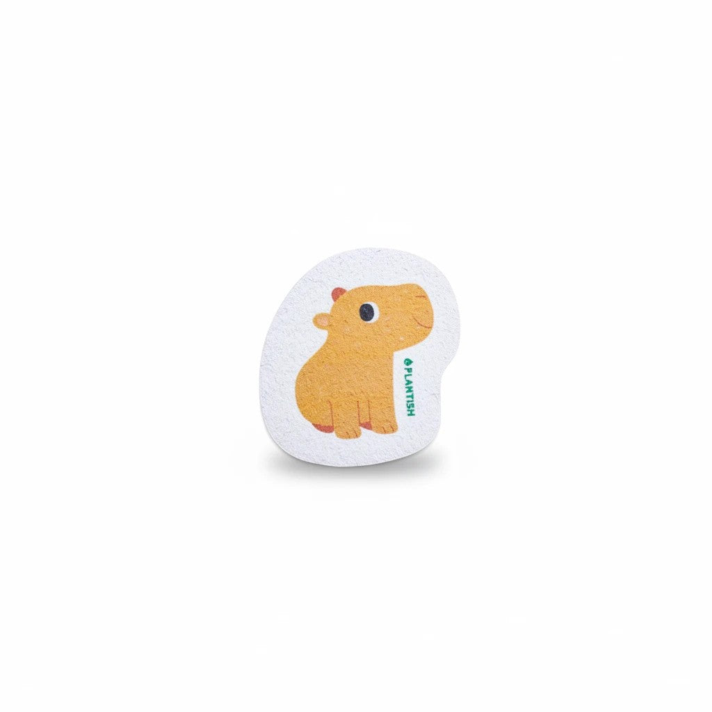 Bubble Gallery Plantish capybara-shaped vegetable cellulose pop-up kitchen sponge on a white background